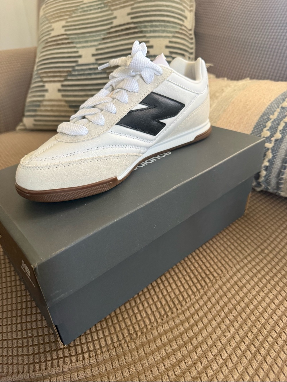New Balance White Sneakers with Black Logo and Brown Gum Sole